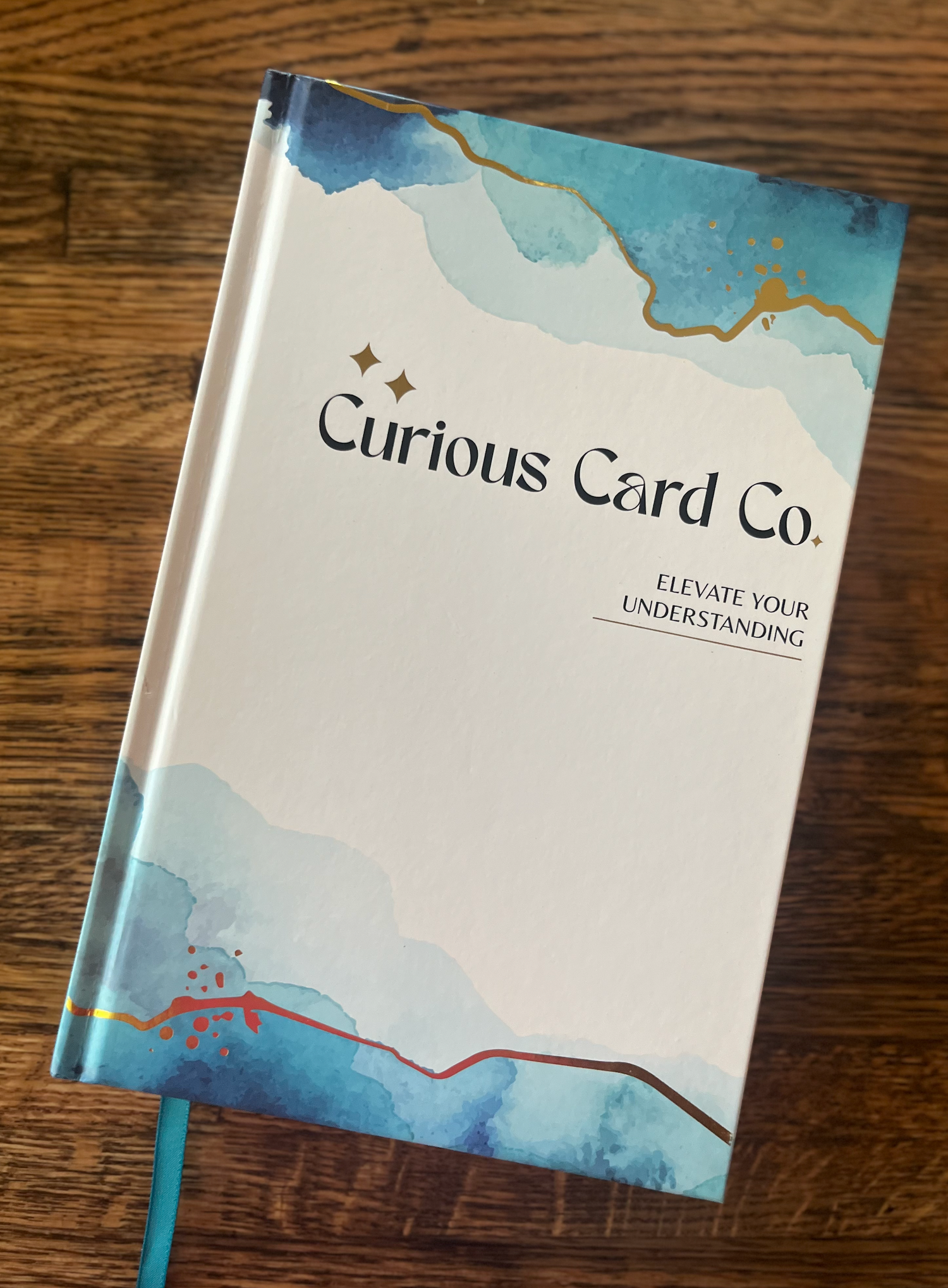 The Curious Card Company package comes with a 208 page blank journal to write down your goals and keep track of your progress towards sobriety.